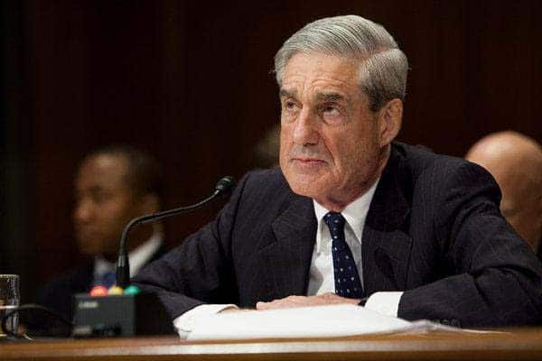 Mueller sits and awaits to hear testimony