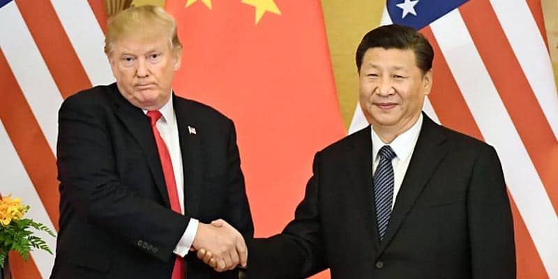 Trump shaking hands with China's leaders
