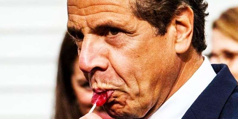 andrew cuomo licking a lollipop