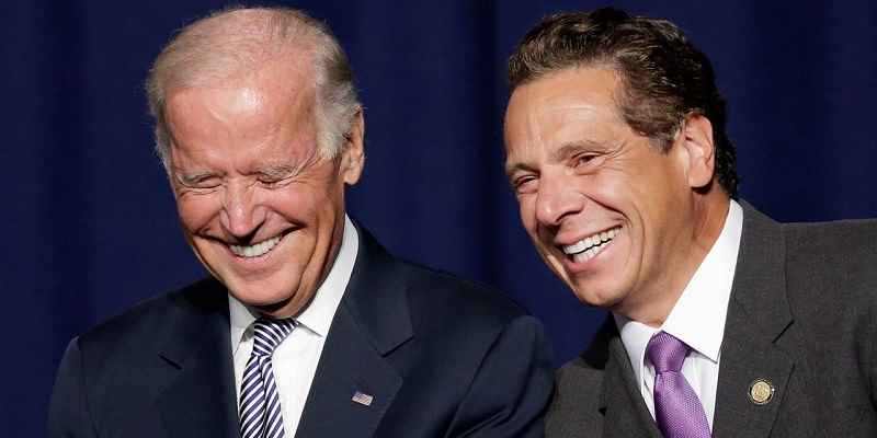 Biden standing to the left of Andrew Cuomo