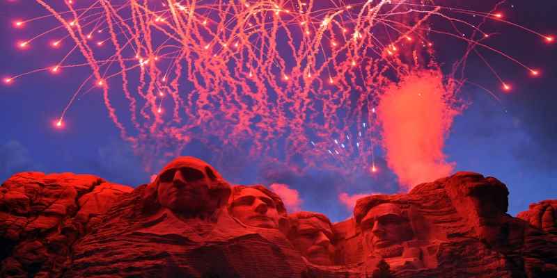 fireworks exploding above Mt. Rushmore