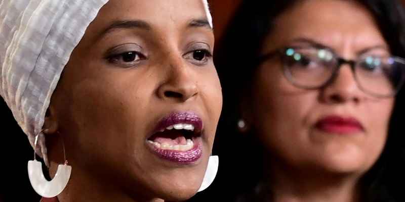 Ilhan Oman to the left of Rashida Tlaib