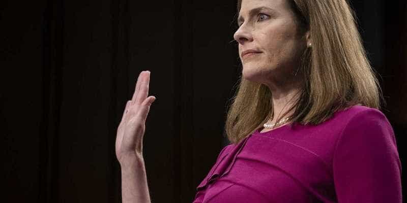 amy coney barrett giving her oath before supreme court hearings