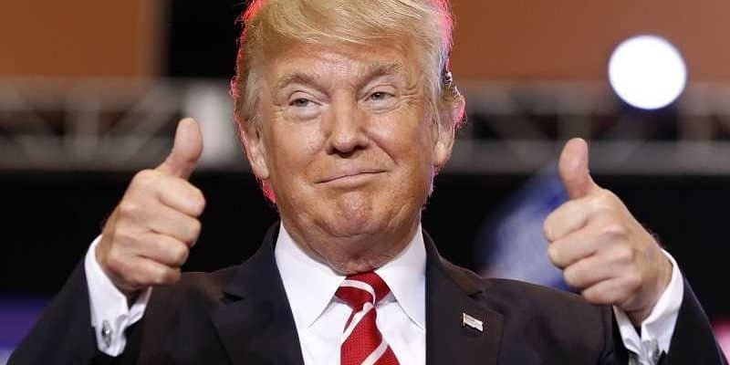 president donald trump giving thumbs up sign